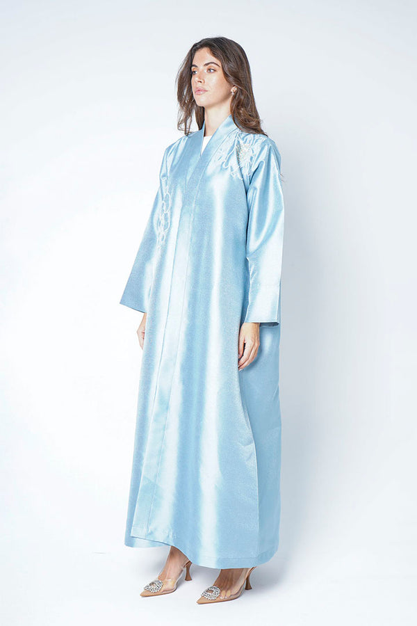 Light blue abaya with embellished details on the shoulders