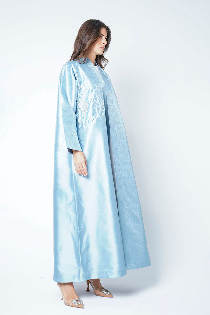 Light blue abaya with embellished details on the shoulders